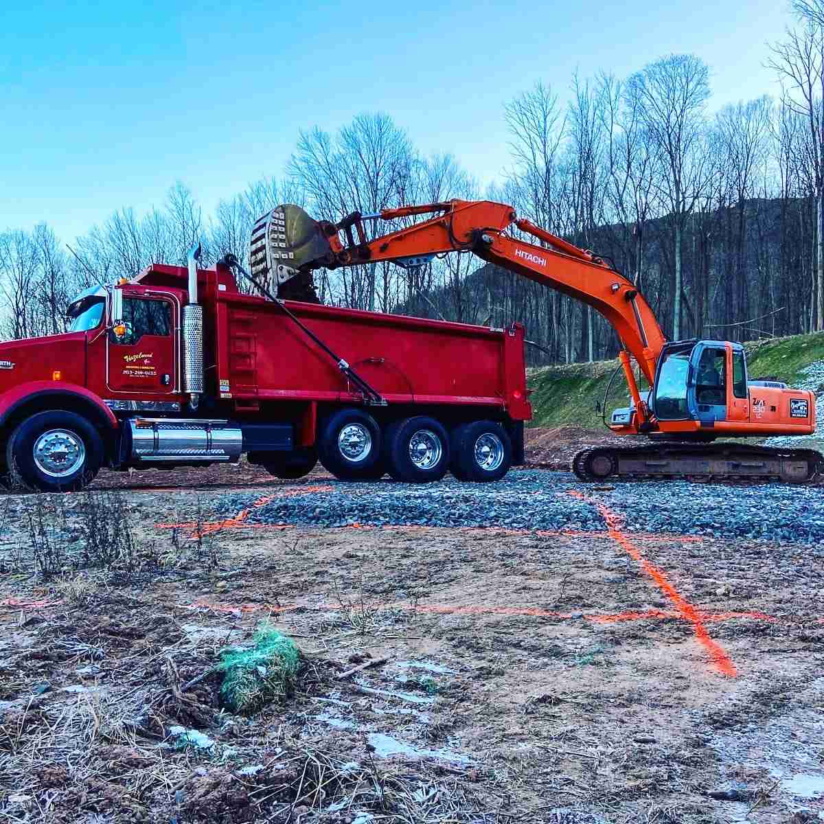 Hazelwood Inc using their Kenworth truck and their hatachi excavator on a jobsite. They are the leading site work contractor in New Haven County, CT based in Wallingford, CT